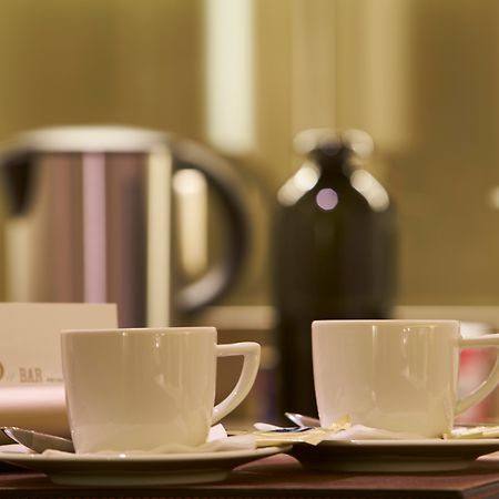 Portobay Flores Exterior photo Coffee and tea service