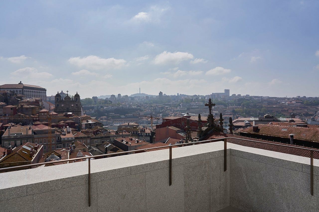 Portobay Flores Exterior photo View of the city from the rooftop of the hotel